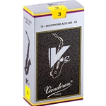 A single Vandoren V12 Alto Saxophone reed strength 3.0 resting on its factory protective sleeve wrapper.
