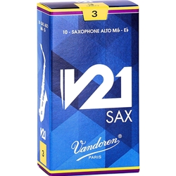 A single Vandoren V21 Alto Saxophone reed strength 3.0 resting on its factory protective sleeve wrapper.