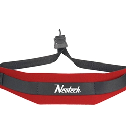 A bright red Neotech Soft Sax Strap featuring a cushioned neoprene neck pad and a black vinyl-coated open metal hook attached to adjustable nylon webbing.